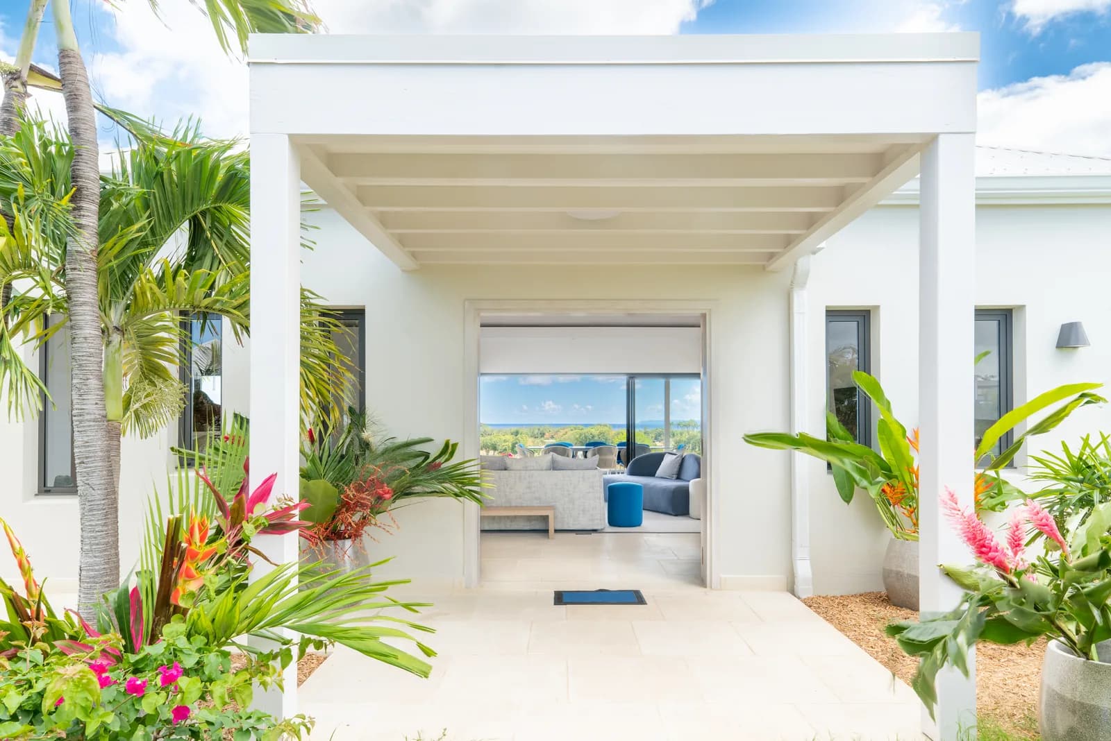 Belles Rives villa — open-plan living room with lagoon view